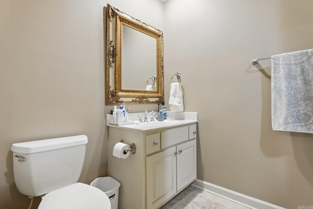 53 Maisons, Little Rock, AR 72223 - half bathroom with toilet, vanity, and baseboards