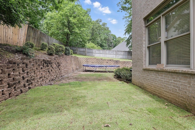 53 Maisons, Little Rock, AR 72223 - view of yard featuring a trampoline