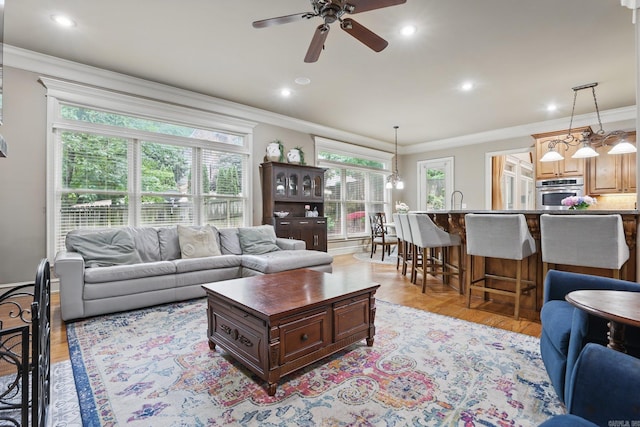 53 Maisons, Little Rock, AR 72223 - living room with a ceiling fan, ornamental molding, light wood-style flooring, and recessed lighting