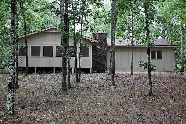 18 Fabulosa Cir, Hot Springs Village, AR 71909 - manufactured / mobile home with crawl space, a chimney, and a sunroom