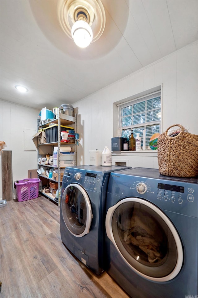 105 Rhode Island St, Beebe, AR 72012 - laundry area with separate washer and dryer and wood finished floors