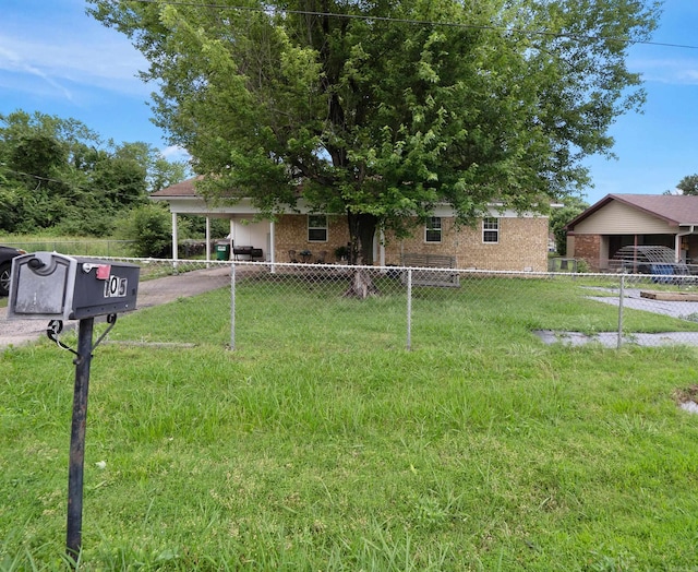 105 Rhode Island St, Beebe, AR 72012 - view of front of home featuring brick siding, an attached carport, and driveway