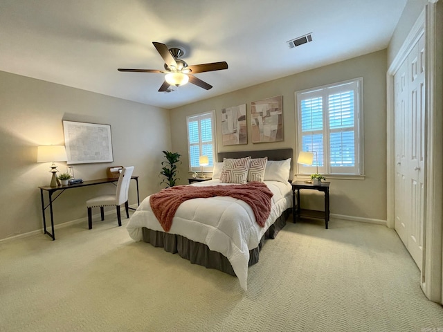 2200 Andover Ct Unit 403, Little Rock, AR 72227 - carpeted bedroom with baseboards, a closet, and a ceiling fan