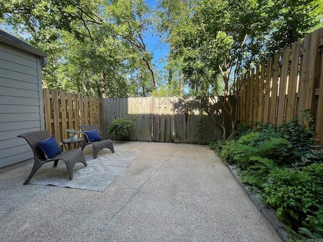 2200 Andover Ct Unit 403, Little Rock, AR 72227 - fenced backyard featuring a patio area