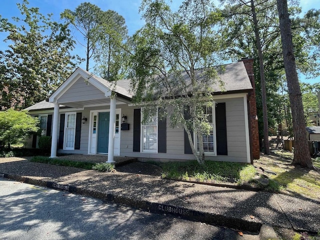 2200 Andover Ct Unit 403, Little Rock, AR 72227 - view of front of home with a porch and a chimney