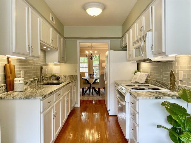 2200 Andover Ct Unit 403, Little Rock, AR 72227 - kitchen featuring white appliances, white cabinetry, and dark wood-style floors