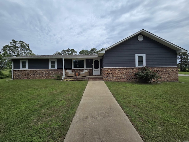 2373 W Rd, Mount Pleasant, AR 72561 - ranch-style house featuring brick siding, a porch, and a front yard