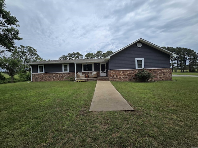 2373 W Rd, Mount Pleasant, AR 72561 - ranch-style house with a front lawn, brick siding, and covered porch
