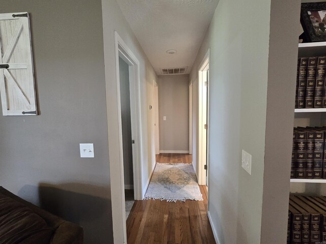 2373 W Rd, Mount Pleasant, AR 72561 - hall with dark wood finished floors and baseboards