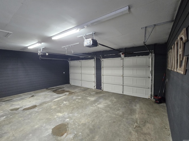2373 W Rd, Mount Pleasant, AR 72561 - garage featuring a garage door opener