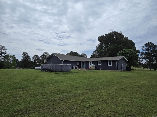 2373 W Rd, Mount Pleasant, AR 72561 - back of property featuring a yard and an outdoor pool