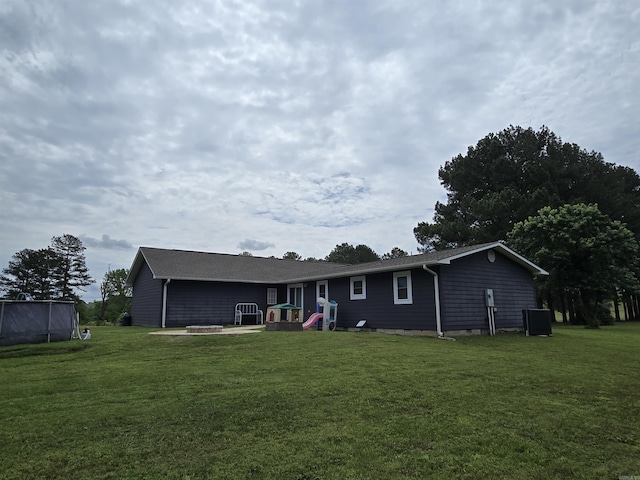 2373 W Rd, Mount Pleasant, AR 72561 - back of house featuring a yard