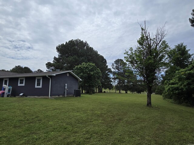 2373 W Rd, Mount Pleasant, AR 72561 - view of green lawn with cooling unit
