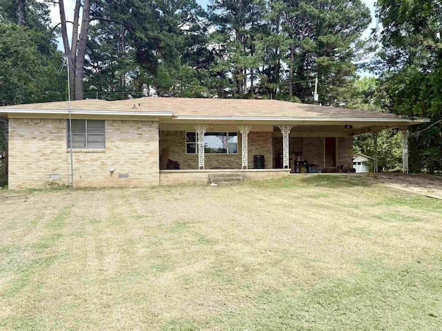 171 Sumter Dr, Malvern, AR 72104 - view of front facade featuring a front yard, a porch, brick siding, crawl space, and view of wooded area