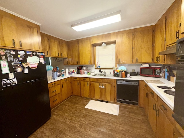 171 Sumter Dr, Malvern, AR 72104 - kitchen featuring black appliances, brown cabinets, light countertops, ornamental molding, and under cabinet range hood