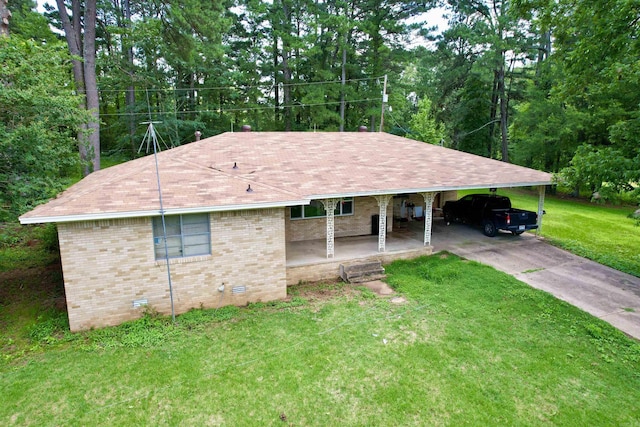 171 Sumter Dr, Malvern, AR 72104 - view of front of property with a front yard, concrete driveway, brick siding, and roof with shingles