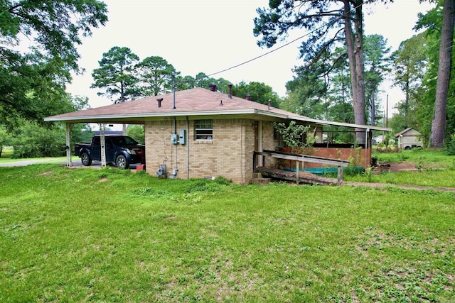 171 Sumter Dr, Malvern, AR 72104 - view of home's exterior with brick siding, a carport, a yard, and crawl space
