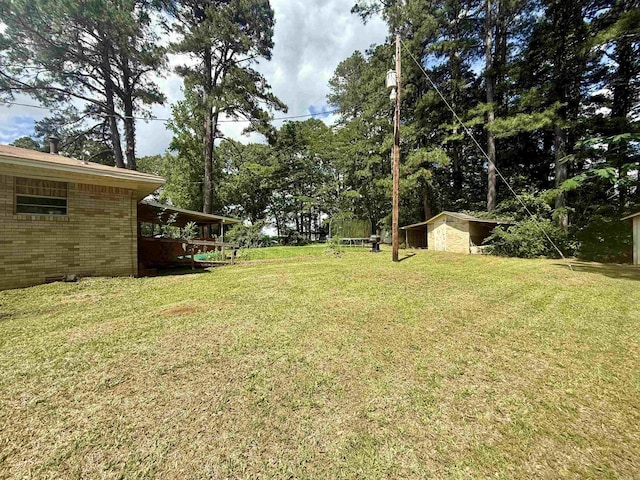 171 Sumter Dr, Malvern, AR 72104 - view of grassy yard with a shed