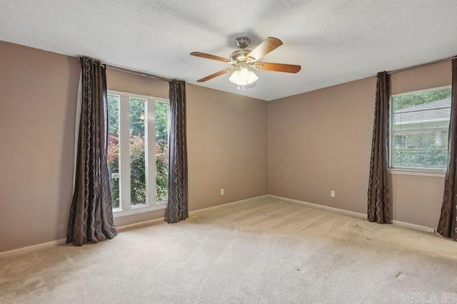 3 Kordsmeier Ct, Little Rock, AR 72205 - spare room with carpet, a ceiling fan, a textured ceiling, and baseboards