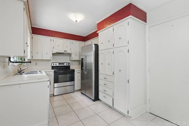 3 Kordsmeier Ct, Little Rock, AR 72205 - kitchen with appliances with stainless steel finishes, under cabinet range hood, a sink, and light tile patterned floors
