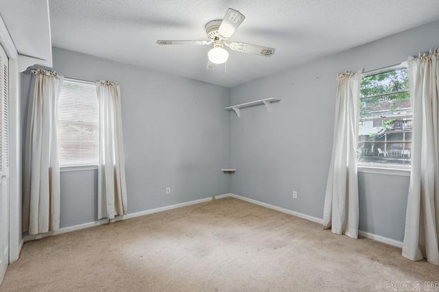 3 Kordsmeier Ct, Little Rock, AR 72205 - carpeted spare room featuring ceiling fan, baseboards, and a textured ceiling
