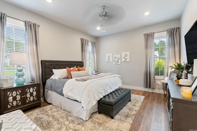 152 Clayboy Dr, Austin, AR 72007 - bedroom with multiple windows, wood finished floors, recessed lighting, baseboards, and ceiling fan