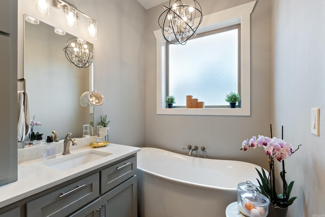 152 Clayboy Dr, Austin, AR 72007 - full bathroom featuring a chandelier, a freestanding tub, and vanity