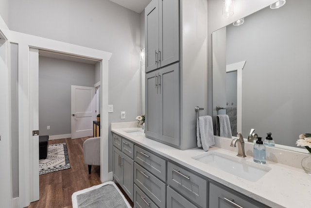 152 Clayboy Dr, Austin, AR 72007 - full bathroom featuring double vanity and wood finished floors