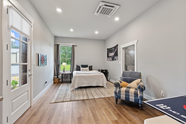 152 Clayboy Dr, Austin, AR 72007 - bedroom with baseboards, wood finished floors, and recessed lighting