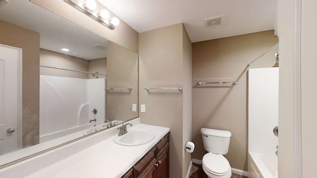 full bathroom with bathtub / shower combination, vanity, toilet, and baseboards