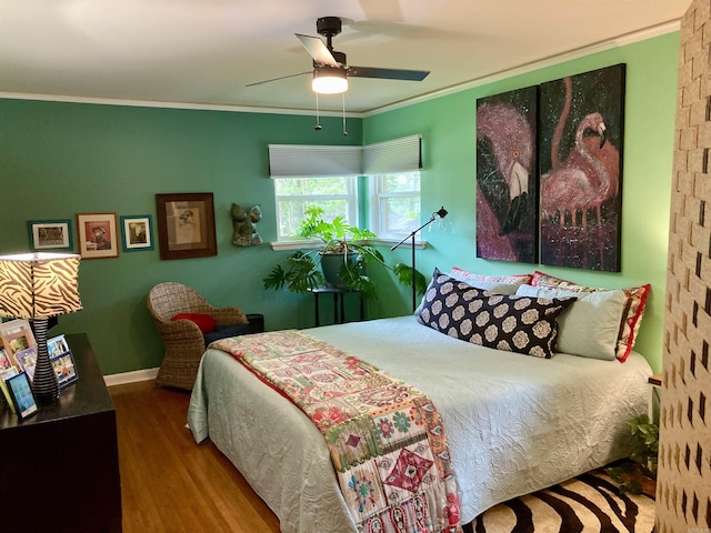 4613 Crestline Dr, North Little Rock, AR 72116 - bedroom featuring wood finished floors, ornamental molding, and ceiling fan