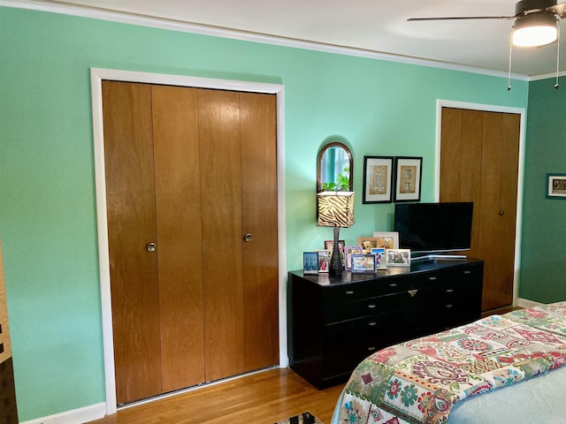 4613 Crestline Dr, North Little Rock, AR 72116 - bedroom with wood finished floors, crown molding, and ceiling fan