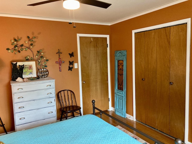 4613 Crestline Dr, North Little Rock, AR 72116 - bedroom featuring wood finished floors, ornamental molding, ceiling fan, and baseboards