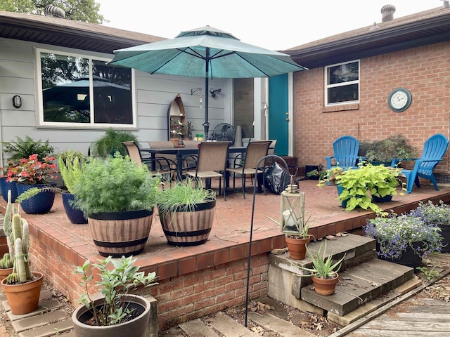 4613 Crestline Dr, North Little Rock, AR 72116 - deck featuring outdoor dining space and a patio area