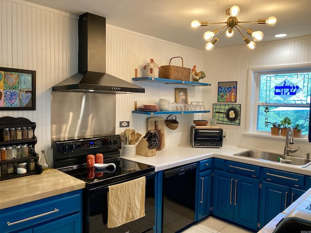 4613 Crestline Dr, North Little Rock, AR 72116 - kitchen with black appliances, wall chimney range hood, blue cabinets, a sink, and ornamental molding