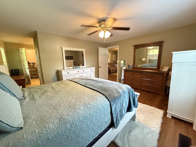 507 E Bruce St, Piggott, AR 72454 - bedroom with wood finished floors and ceiling fan