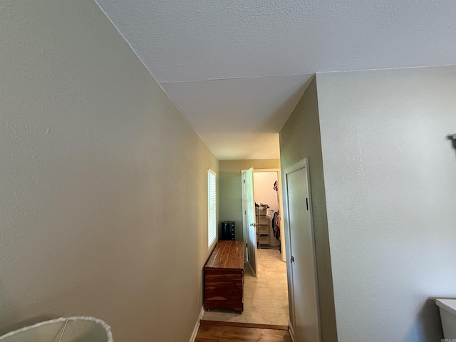 507 E Bruce St, Piggott, AR 72454 - hall with wood finished floors and baseboards
