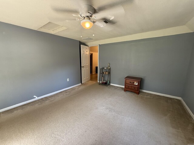 507 E Bruce St, Piggott, AR 72454 - unfurnished bedroom with attic access, carpet, baseboards, and ceiling fan