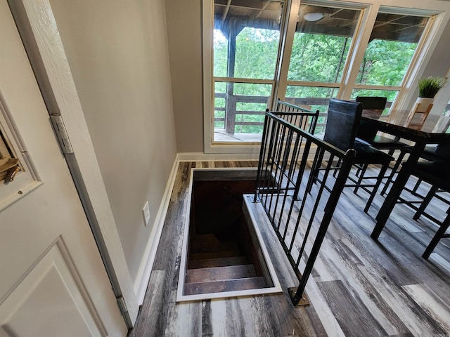 211 Burnt Rock Falls Rd, Fairfield Bay, AR 72088 - stairway with wood finished floors and baseboards