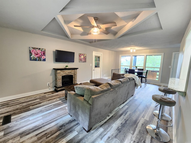 211 Burnt Rock Falls Rd, Fairfield Bay, AR 72088 - living room featuring coffered ceiling, wood finished floors, baseboards, a ceiling fan, and a fireplace
