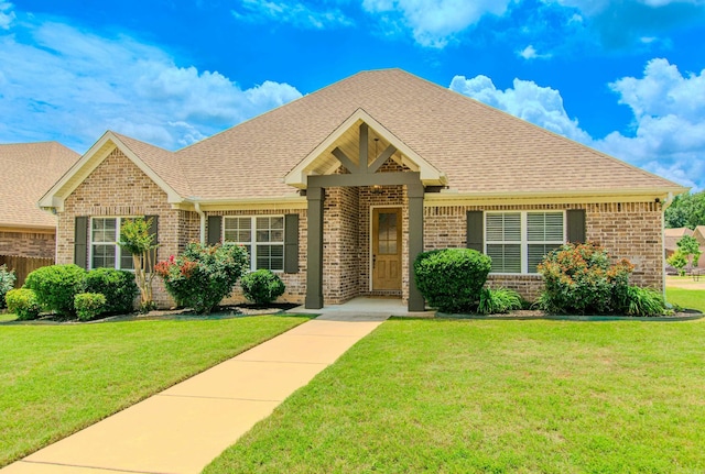 5045 Maple Leaf Dr, Benton, AR 72019 - view of front of property featuring brick siding and roof with shingles