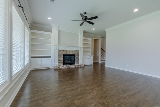 5045 Maple Leaf Dr, Benton, AR 72019 - unfurnished living room with healthy amount of natural light, crown molding, a brick fireplace, ceiling fan, and dark wood finished floors
