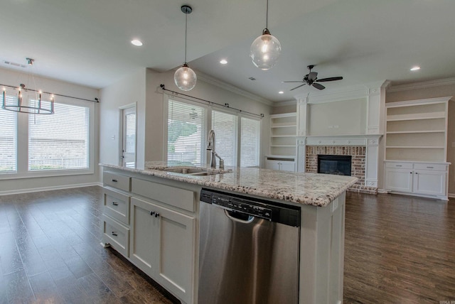 5045 Maple Leaf Dr, Benton, AR 72019 - kitchen with stainless steel dishwasher, a sink, a ceiling fan, ornamental molding, and a brick fireplace