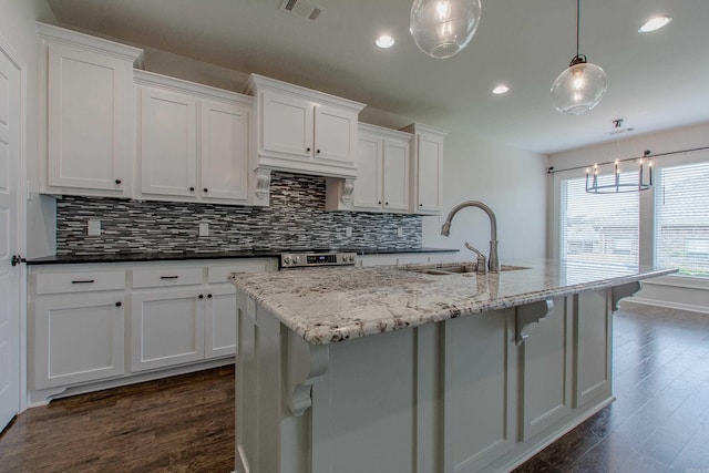 5045 Maple Leaf Dr, Benton, AR 72019 - kitchen featuring a sink, dark wood-type flooring, backsplash, white cabinetry, and recessed lighting