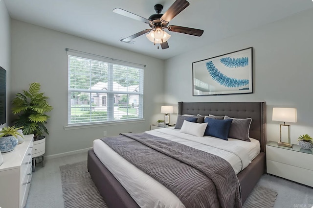 5045 Maple Leaf Dr, Benton, AR 72019 - bedroom with light colored carpet, baseboards, and ceiling fan