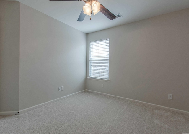 5045 Maple Leaf Dr, Benton, AR 72019 - spare room featuring light carpet, a ceiling fan, and baseboards