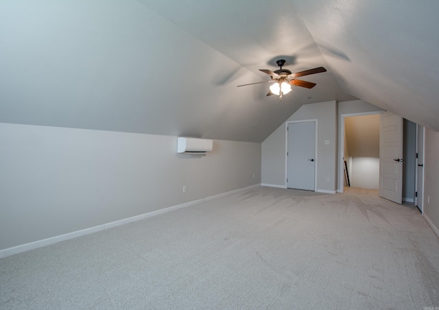 5045 Maple Leaf Dr, Benton, AR 72019 - bonus room featuring a wall mounted AC, light colored carpet, lofted ceiling, a ceiling fan, and baseboards