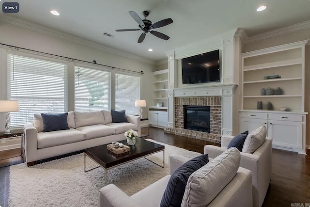 5045 Maple Leaf Dr, Benton, AR 72019 - living area with dark wood-type flooring, crown molding, a ceiling fan, recessed lighting, and built in features