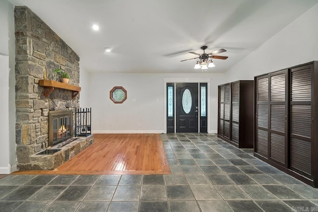 208 Independence Dr, Hot Springs, AR 71913 - foyer featuring a ceiling fan, baseboards, a stone fireplace, vaulted ceiling, and recessed lighting