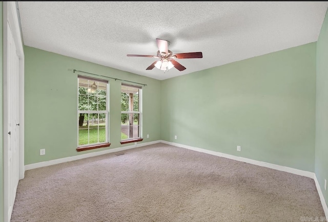 208 Independence Dr, Hot Springs, AR 71913 - carpeted spare room with ceiling fan, baseboards, and a textured ceiling